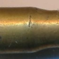 (13720)  UNE CARTOUCHE .7mm Center Fire a Blanc  par SFM Bouteillée