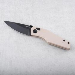 Couteau Real Steel Spectrum Tan Lame Acier Nitro V Black Manche G10 IKBS Button Lock RS7142IB