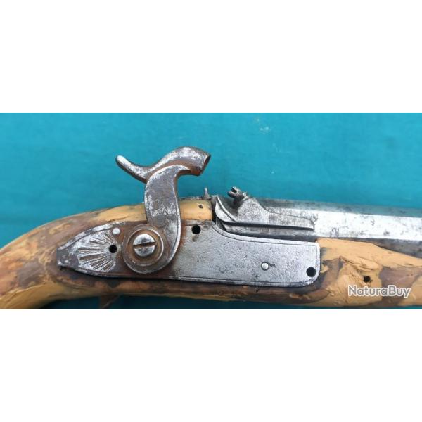 Pistolet  percussion    19m n1A .  (a restaurer)