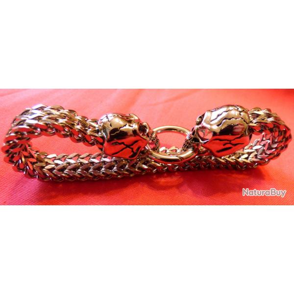 SUPER BEAU BRACELET EN ACIER INOX ARGENTE AVEC 2 TTES DE MORT SE FAISANT FACE MORDANT LE FERMOIR