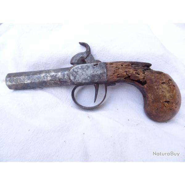 p18)  pistolet a un canon , coup de poing ,