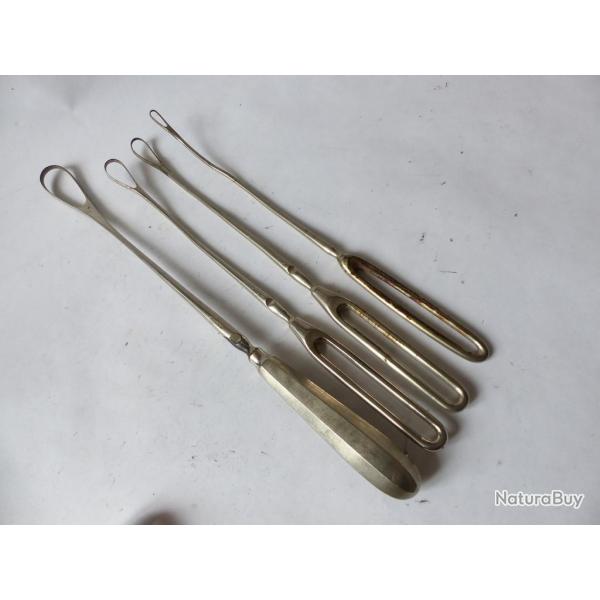 Lot de quatre Curettes utrines tranchantes instruments de mdecine