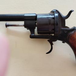 revolver a broche