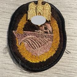 un insigne tissu allemand avec aigle métal doré ww2