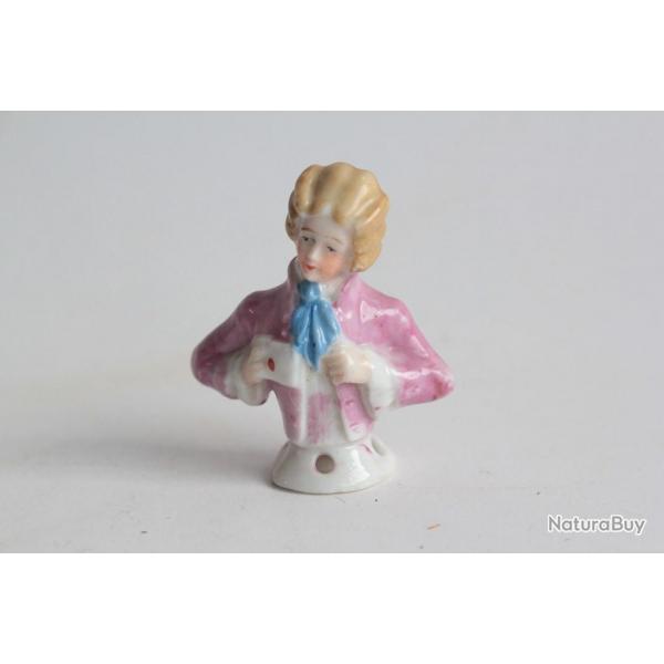 Demi figurine porcelaine Garon tenant une lettre
