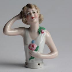 Demi figurine porcelaine Femme à la rose