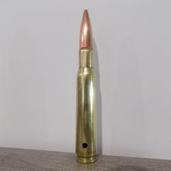 Cartouche calibre 12.7mm neutralisée par perçage.