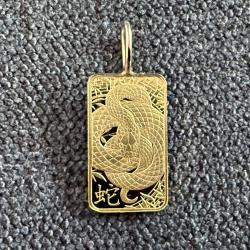 Petit pendentif Lingot or 1 g monté en pendentif - Suisse - 24 carats - Heraeus- Serpent