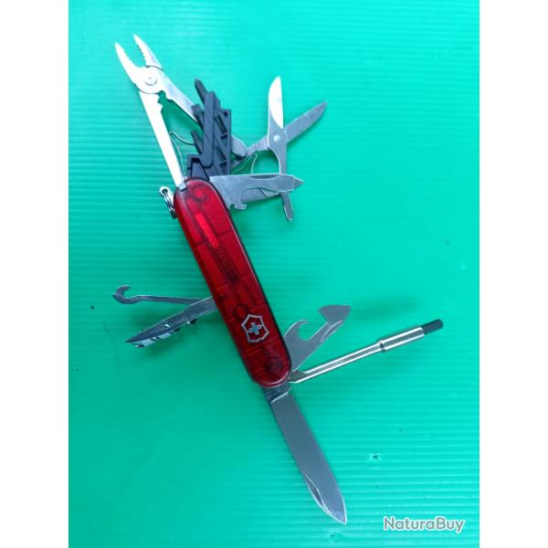VICTORINOX  HUNTSMAN  TRANSLUCIDE  .  BEL  ETAT . COMPLET  . BELLE PIECE  .