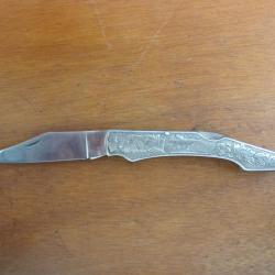 Couteau pliant manche en métal gravé 1990