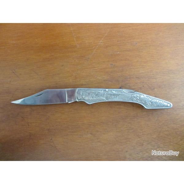 Couteau pliant manche en mtal grav 1990