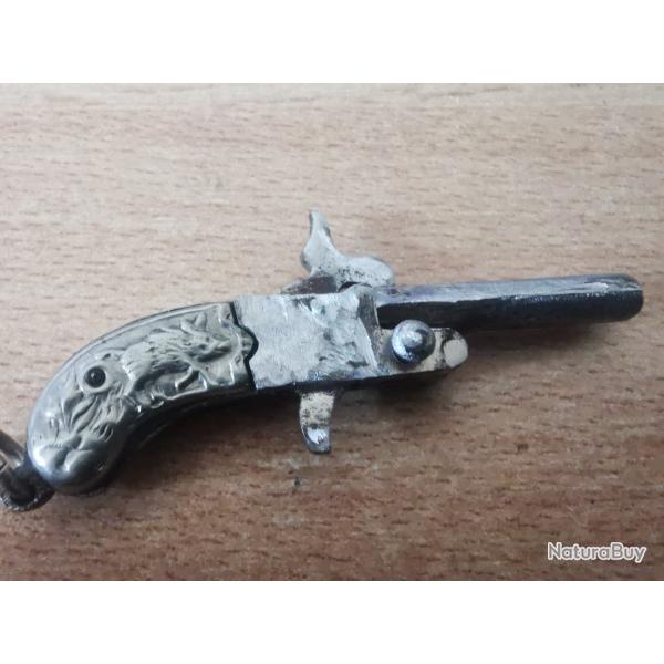 Pistolet Franz Pfannl 2 mm  broche systme LEFAUCHEUX de 1890.