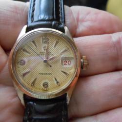 rolex précision dame ,cadran nid d'abeille champagne A VOIR EXCEPTIONNELLE