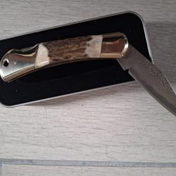 Couteau bois de cerf lame damas