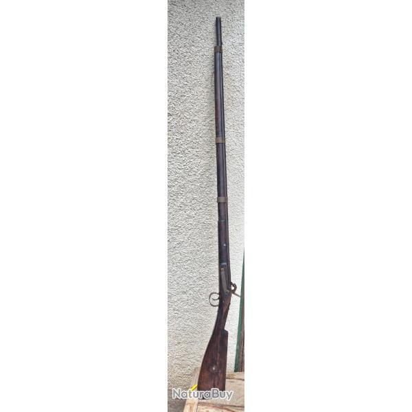 Fusil a capsule trs vieux etat pas trap mal