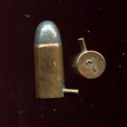 7 mm à broche à balle - marquage en relief au centre du culot : 7 - étui cuivre