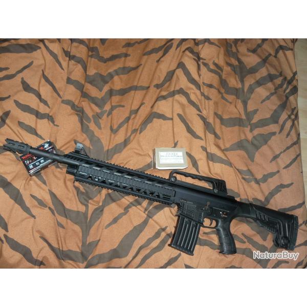 fusil UZKON semi auto canon lisse 50 cm cal 12/76  chargeursamovible 5 coups modle TR100