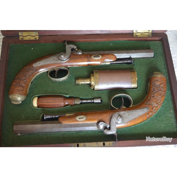 Elgante paire de pistolets de dame en coffret XIXme sicle