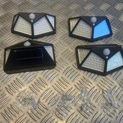 kit de 4 lampes solaires murales extérieures à 100 LED