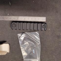 Un Rail Picatinny pour garde main M lock, 9 slots neuf sous emballage. -
