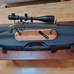 très belle carabine Rhoner 22lr avec lunette 6-24x50 AEG silencieux et mallette  1uro sans réserve