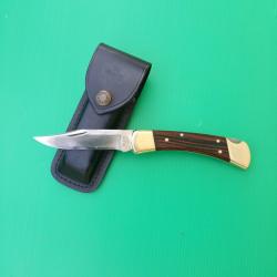 COUTEAU :  BUCK  110  AVEC SON FOURREAU CUIR  .