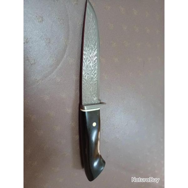 Couteau forg par Jean Paul Sire damas barreaux motif explosion manche en phacochre bne