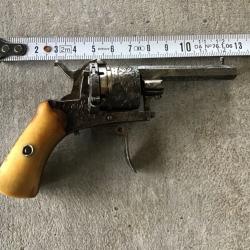 Revolver à broche