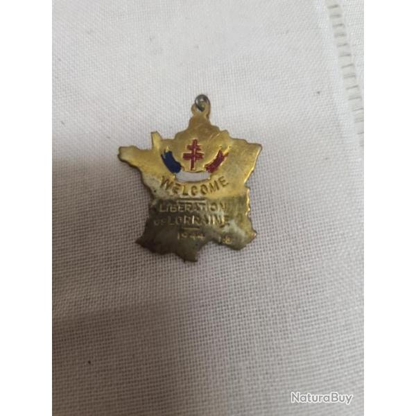 Insigne libration WW2 original A25.21