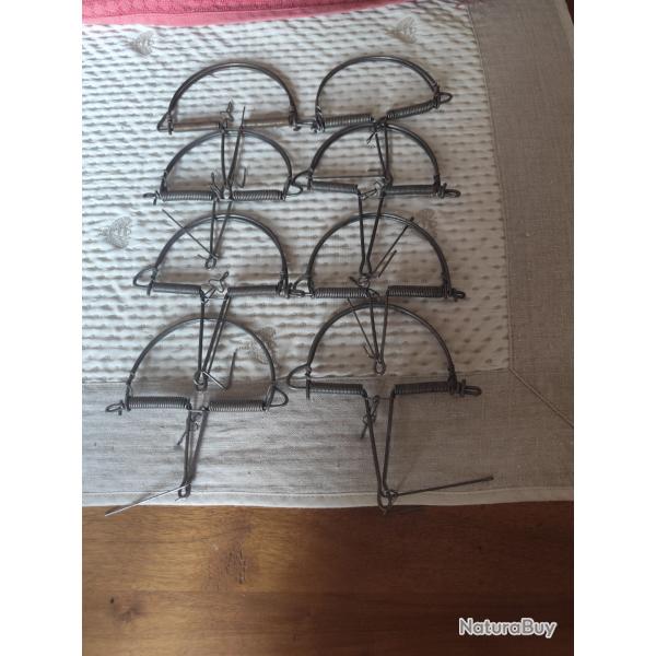 Lot de huit petits piges  oiseaux