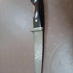 Couteau forgé  par Jean Paul Sire damas barreaux motif explosion manche en phacochère ébène