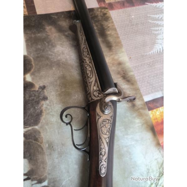 trs beau fusil a broche