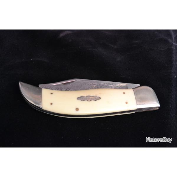 Couteau  "Deer slayer" made in japan , manche ivoire