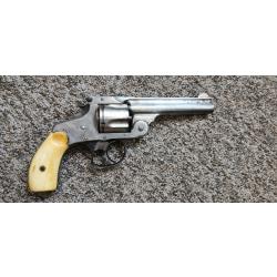 Smith & Wesson top break cal 38 plaquettes en ivoire