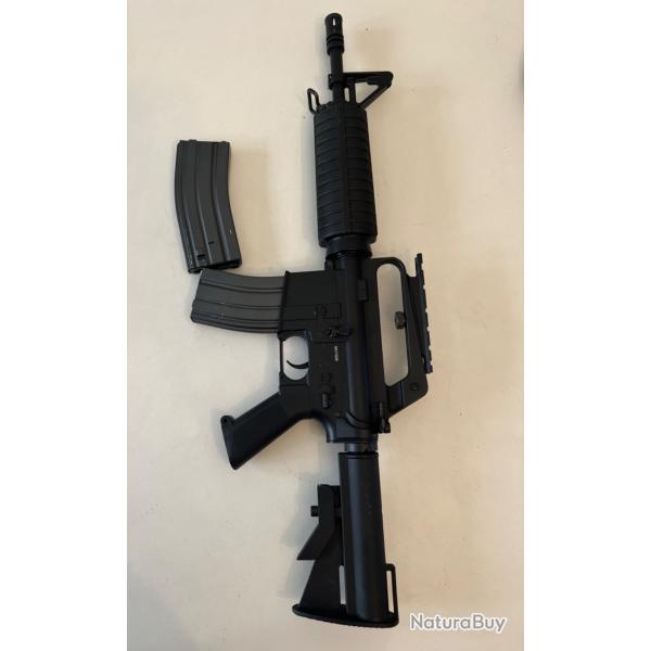 Vends M4 XM177 Cyma aeg avec 2 chargeurs et rail pour optique