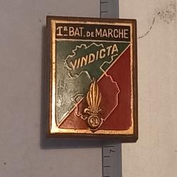 Insigne du 1er bataillon de marche du 1er régiment étranger d'infanterie (1er REI)
