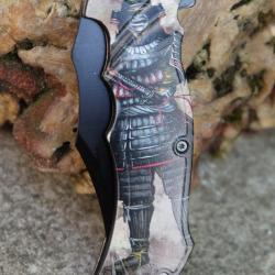 Couteau Warrior Décor Guerrier Samouraï A/O Lame Clip Point Noire Inoxydable Manche ABS Linerlock