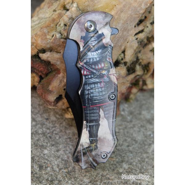 Couteau Warrior Dcor Guerrier Samoura A/O Lame Clip Point Noire Inoxydable Manche ABS Linerlock