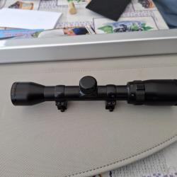 A vendre lunette Bushnell banner waterproof 7 1.5-4.5 état impeccable  avec montage  cz complet