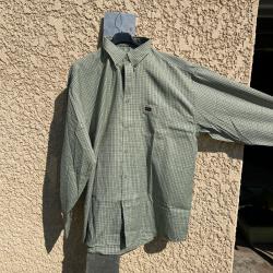 Chemise manches longues. Marque le chameau.