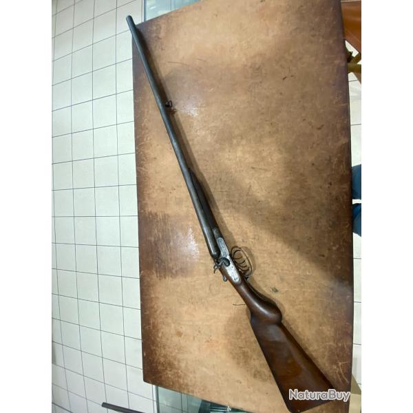 Fusil calibre 12 Canon DAMAS , juxtapos