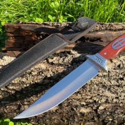 Couteau Russe manche bois de rose orné enchère
