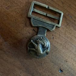 Boucle de ceinturon en bronze à identifier
