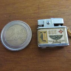 Mini briquet à essence 1960