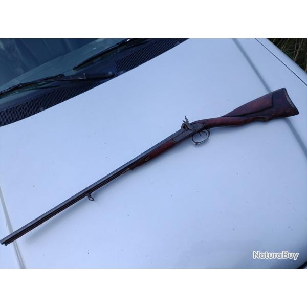 Fusil a percussion calibre 20 crosse sculpte