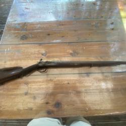 Vieux fusil de chase dans son jus