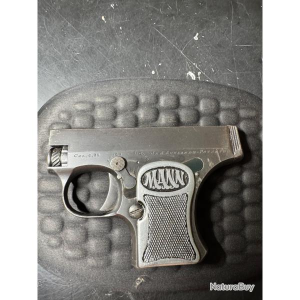 Ressort,pièce de recouvrement du mécanisme sous plaquettes de crosse pistolet fritz mann 6.35