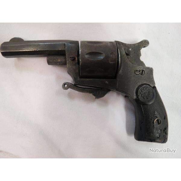 Rare petit revolver  jection automatique de chaque cartouche tir cal 22