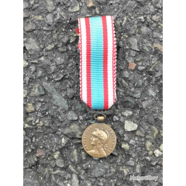Rduction mdaille commmorative d' AFN original.