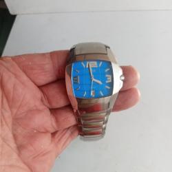montre lotus a fond bleu pile remis à neuf
